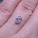 Bright Red Dark Opal, 0.56ct from Lighting Ridge, Australia