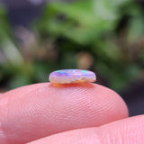 Green Crystal Opal with Inclusions, 0.86ct from Lighting Ridge, AUS
