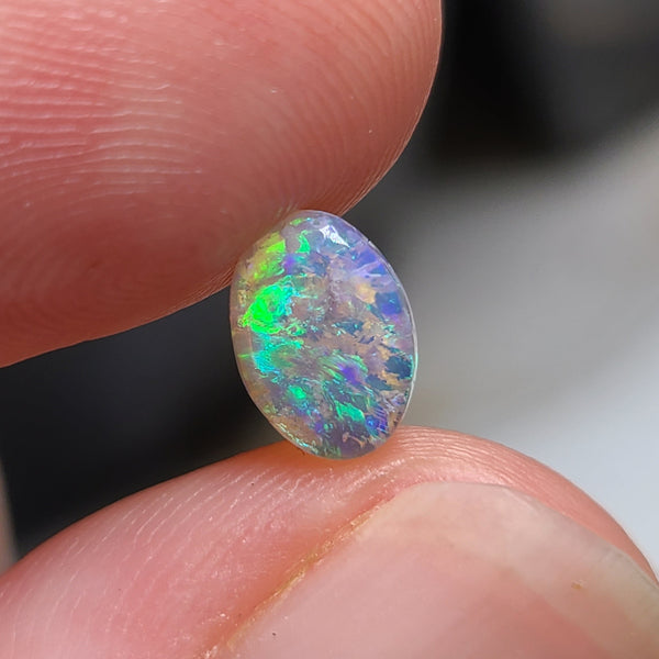 Green Crystal Opal with Inclusions, 0.62ct from Lighting Ridge, AUS