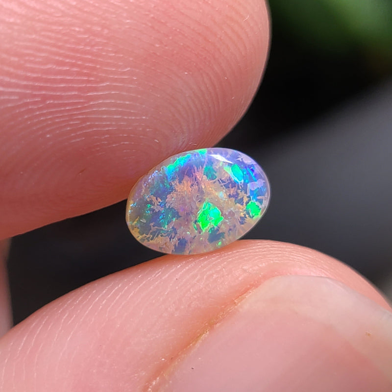 Green Crystal Opal with Inclusions, 0.62ct from Lighting Ridge, AUS