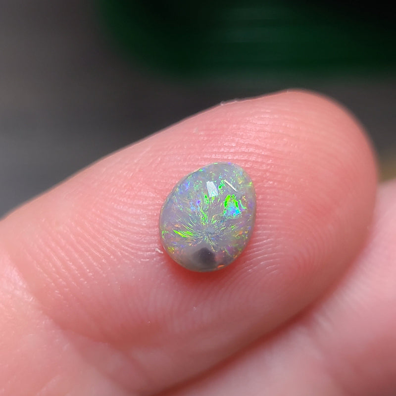 Colorful Dark Opal, 0.64ct from Lighting Ridge, AUS