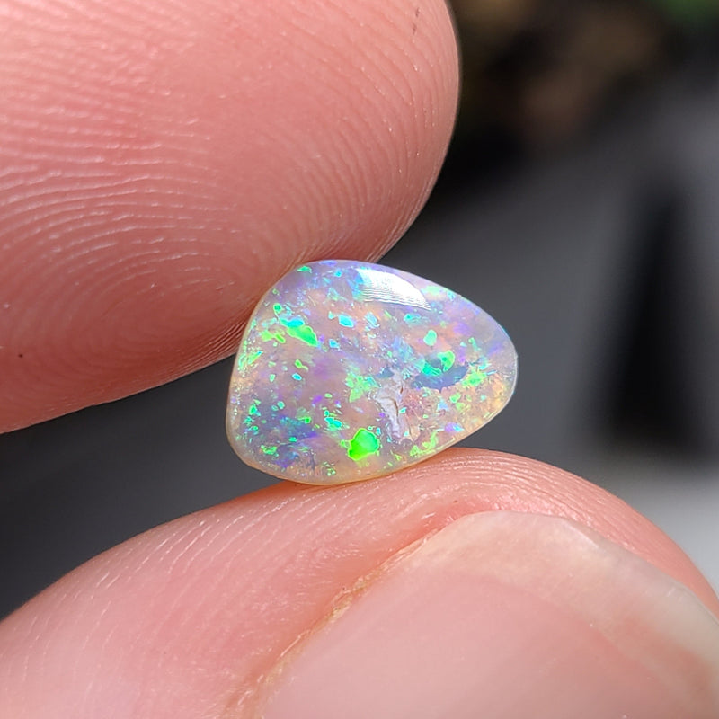 Green Crystal Opal with Inclusions, 0.86ct from Lighting Ridge, AUS
