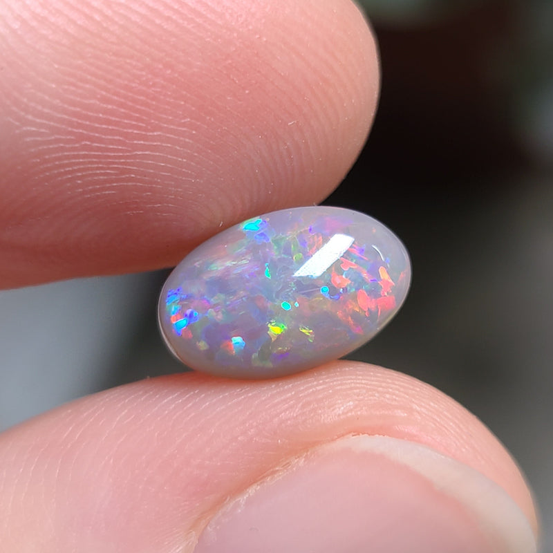 Colorful Dark Opal,  2.04ct from Lighting Ridge, Australia