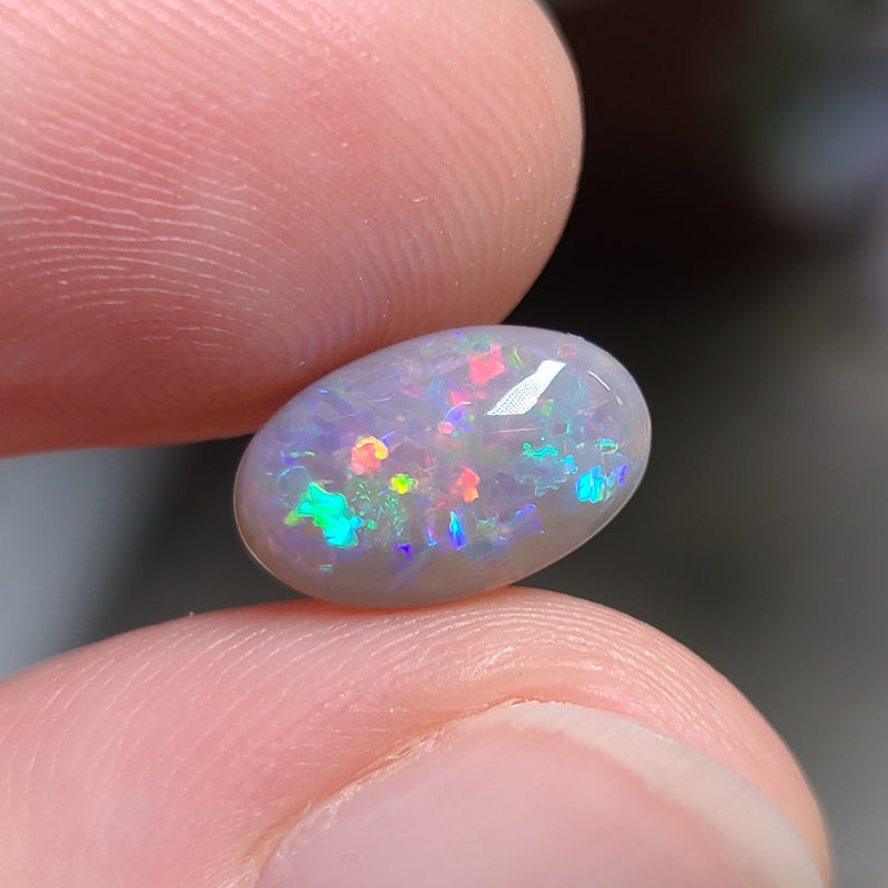 Colorful Dark Opal,  2.04ct from Lighting Ridge, Australia