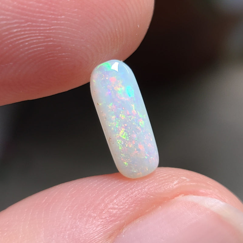 Colorful Light Opal,  0.99ct from Lighting Ridge, Australia