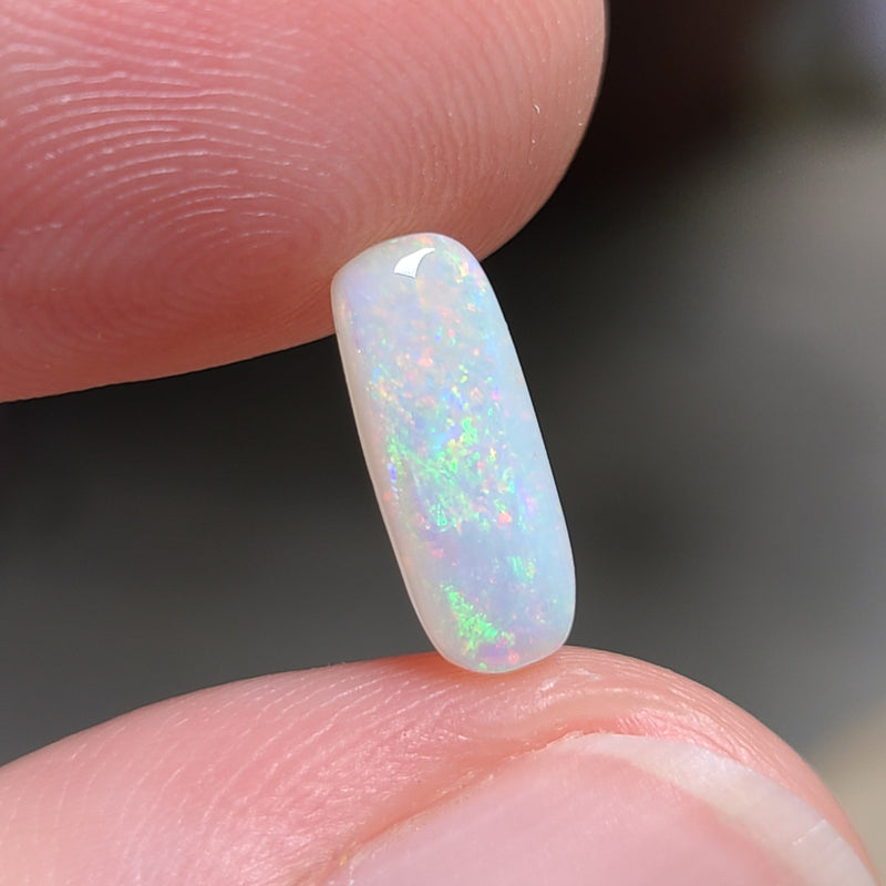 Colorful Light Opal,  0.99ct from Lighting Ridge, Australia