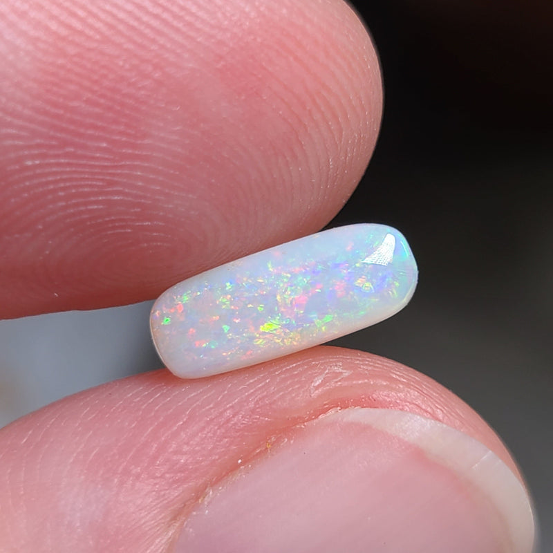 Colorful Light Opal,  0.99ct from Lighting Ridge, Australia