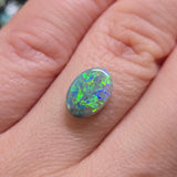 Opal stone on finger 
