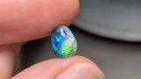 Bright Green Crystal Opal with Inclusions, 0.99ct from Lighting Ridge, AUS