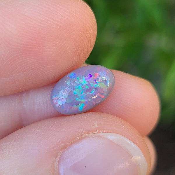 Colorful dark opal, 2.10ct