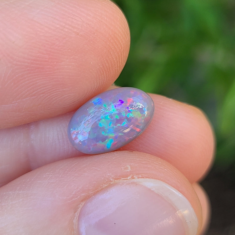 Colorful dark opal, 2.10ct
